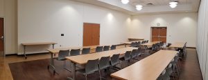 Meeting Room South setup with tables and chairs
